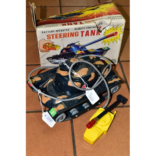 506 - A BOXED MARX TOYS STEERING TANK, remote controlled, battery operated, in play worn condition, with o... 