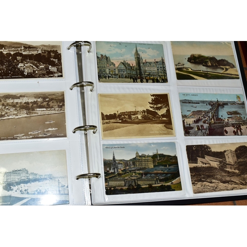 511 - POSTCARDS, two albums containing approximately 720 Edwardian and early-mid 20th century Postcards fe... 