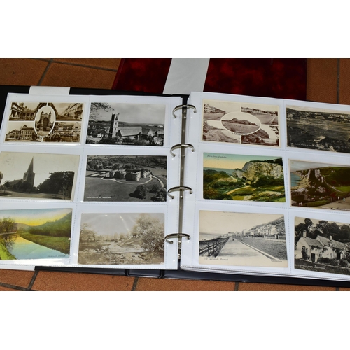 511 - POSTCARDS, two albums containing approximately 720 Edwardian and early-mid 20th century Postcards fe... 