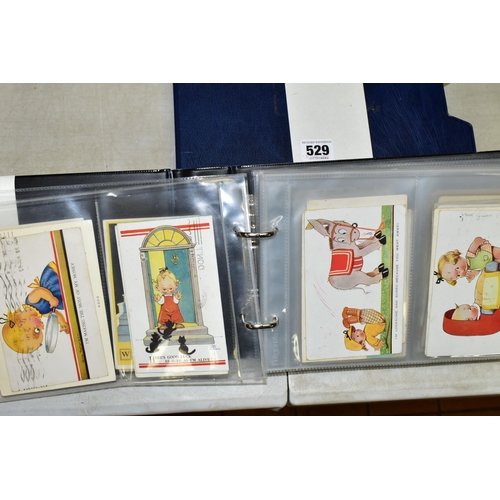 529 - POSTCARDS, one album containing 129 early 20th century Postcards on a Children's theme featuring exa... 