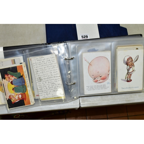 529 - POSTCARDS, one album containing 129 early 20th century Postcards on a Children's theme featuring exa... 