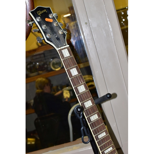 545 - A LES PAUL STYLE GUITAR with tobacco sunburst finish, bolt on neck, rosewood fingerboard with Mother... 