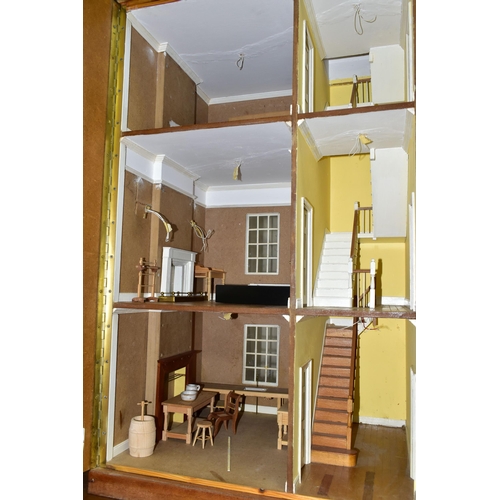 552 - ARTHUR'S HOUSE: A LARGE HANDMADE WOODEN DOLLS HOUSE, modelled as a Georgian Town house, front openin... 