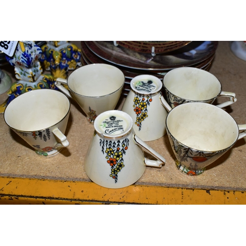 568 - A GROUP OF CERAMICS, to include a pair of tin glazed earthenware candlesticks, a nine piece Royal Gr... 