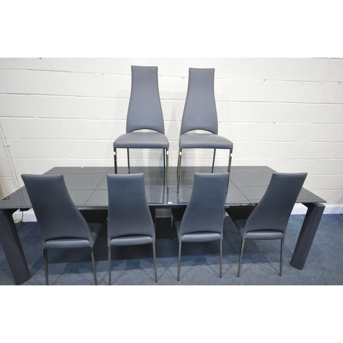 1198 - A CALLIGARIS ESTESO GRAPHITE GLASS EXTENDING TABLE, with a pull out leaves, on a smart mechanism, tw... 