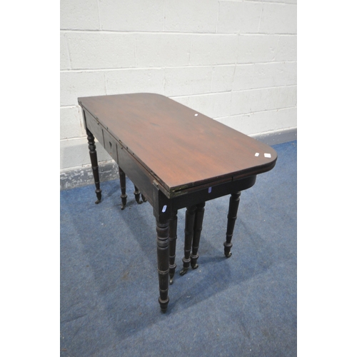 1199 - A REGENCY MAHOGANY CONCERTINA ACTION EXTENDING DINING TABLE, with two sized additional leaves, on te... 