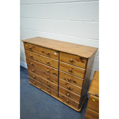 1325 - A MODERN PINE SIDEBOARD/CHEST OF TWELVE DRAWERS, width 117cm x depth 40cm x height 97cm, and a dress... 