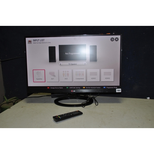 1061 - A LG 27MS73V-PZ 27in TV with remote PAT pass and working)