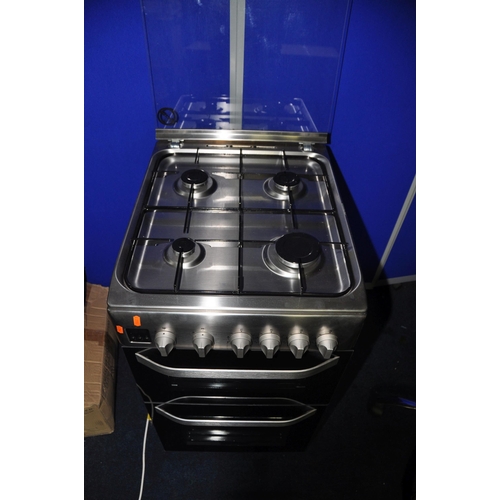 1064 - A HOTPOINT HD5G00CCX/UK GAS COOKER measuring width 50cm x depth 66cm x height 93cm (UNTESTED)