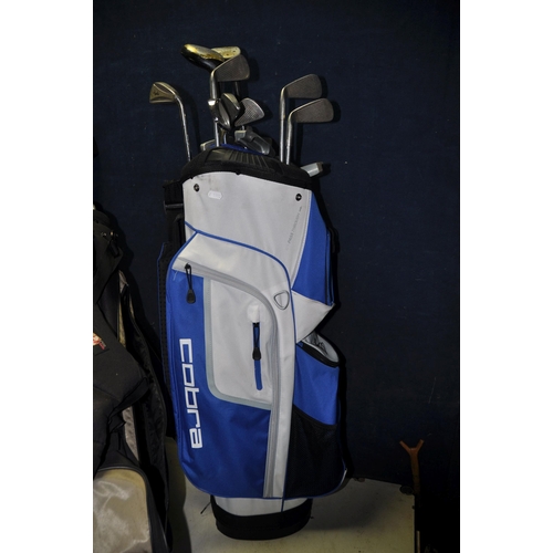 1084 - SELECTION OF GOLFING EQUIPMENT to include three golf bags a Cobra, Slazenger and Hippo golf containi... 