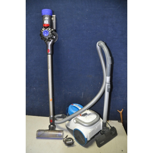 1093 - A DYSON SV10 ANIMAL CORDLESS VACUUM with charger along with a Hoover TSP2006 vacuum cleaner (both PA... 