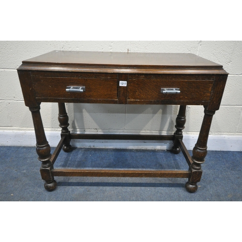 1217 - AN OAK SIDE TABLE, with two drawers, width 92cm x depth 46cm x height 46cm (condition:-surface scrat... 