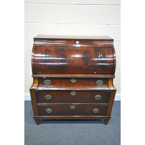 1220 - AN 18TH CENTURY CONTINENTAL MAHOGANY BARREL BUREAU, the pull out writing surface opening the barrel ... 