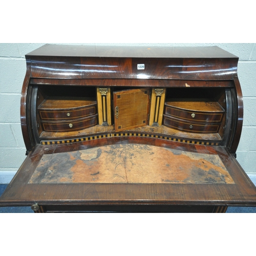 1220 - AN 18TH CENTURY CONTINENTAL MAHOGANY BARREL BUREAU, the pull out writing surface opening the barrel ... 