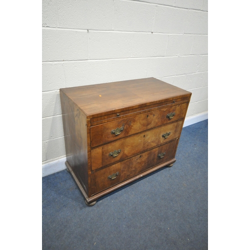 1221 - A LATE 18/EARLY 19TH CENTURY FIGURED WALNUT CHEST OF THREE LONG DRAWERS, brushing slide two with wri... 