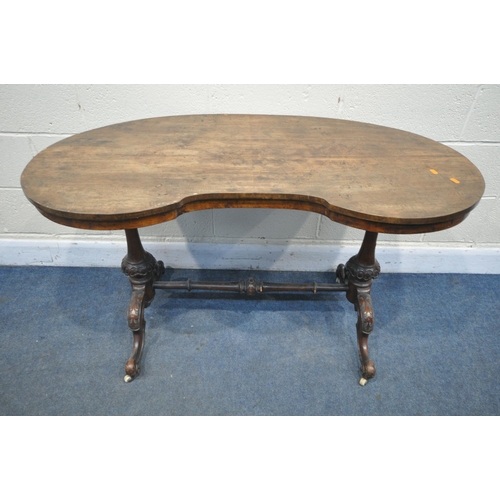 1225 - A LATE VICTORIAN WALNUT KIDNEY TABLE, on turned supports, and stretchers, length 121cm x depth 65cm ... 