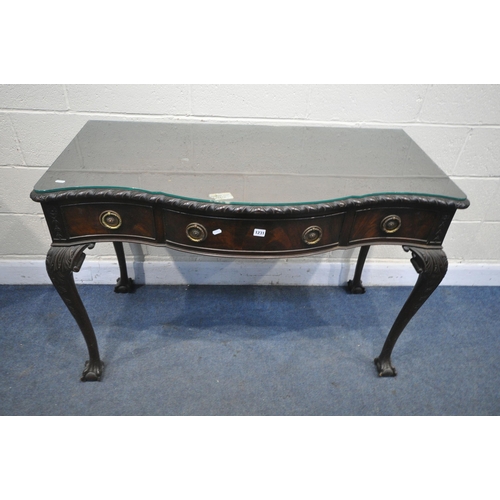 1231 - A MERRYWEATHER OF HOLLOWAY LONDON VICTORIAN MAHOGANY SERPENTINE SIDE TABLE, with three frieze drawer... 