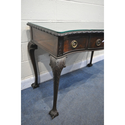 1231 - A MERRYWEATHER OF HOLLOWAY LONDON VICTORIAN MAHOGANY SERPENTINE SIDE TABLE, with three frieze drawer... 