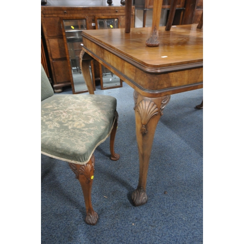 1234 - AN EARLY 20TH CENTURY QUEEN ANNE STYLE WALNUT EXTENDING DINING TABLE, with a single additional leaf,... 