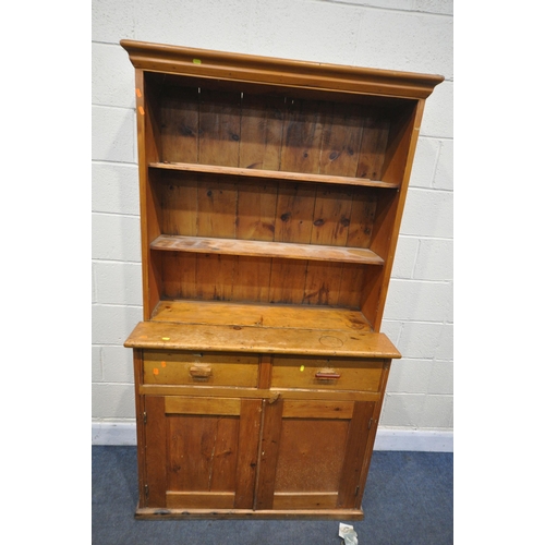 1239 - A 19TH CENTURY SATINWOOD GLAZED SINGLE DOOR CORNER CUPBOARD, enclosing two shelves, over a panelled ... 