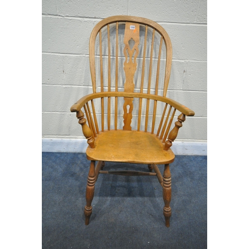 1242 - AN ELM AND BEECH HOOP BACK SPOONBACK CHAIR