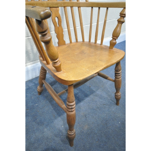 1242 - AN ELM AND BEECH HOOP BACK SPOONBACK CHAIR