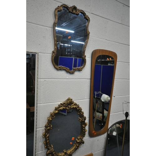 1250 - A SELECTION OF WALL MIRRORS, of various sizes, and materials, along with a mid century teak standard... 