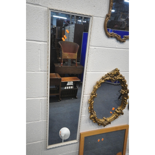 1250 - A SELECTION OF WALL MIRRORS, of various sizes, and materials, along with a mid century teak standard... 