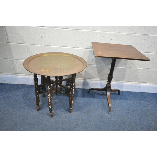 1255 - AN ANGLO INDIAN FOLDING TRAY TABLE, with a circular brass tray, diameter 64cm x height 57cm, the fol... 