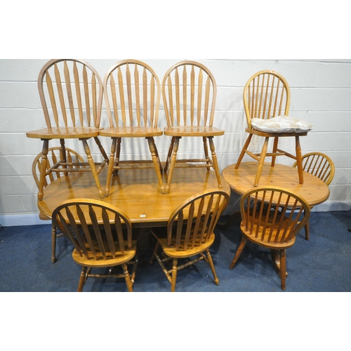 1261 - A HARDWOOD PEDESTAL DINING TABLE, length 153cm x depth 107cm x height 75cm, six hoop back chairs, an... 