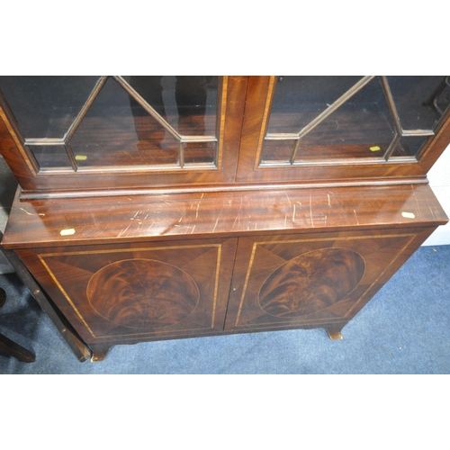 1264 - AN MAHOGANY WIND OUT DINING TABLE, with a single additional leaf, extended length 169cm x closed len... 