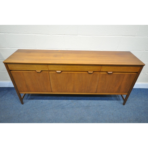 1266 - A MID CENTURY NATHAN SIDEBOARD, with three drawers, over cupboard doors flanking a fall front doors,... 