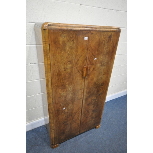 1272 - AN ART DECO FIGURED WALNUT TWO DOOR GENTLEMANS WARDROBE, enclosing a fitted interior, width 84cm x d... 