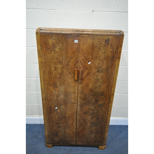 1272 - AN ART DECO FIGURED WALNUT TWO DOOR GENTLEMANS WARDROBE, enclosing a fitted interior, width 84cm x d... 