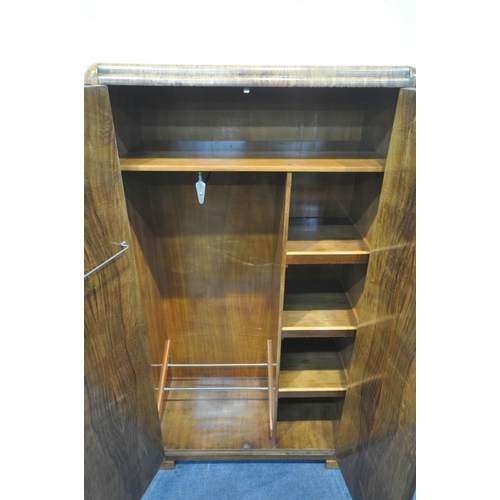 1272 - AN ART DECO FIGURED WALNUT TWO DOOR GENTLEMANS WARDROBE, enclosing a fitted interior, width 84cm x d... 