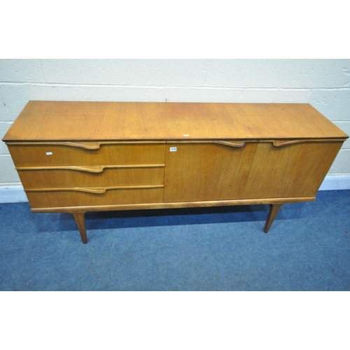 1275 - A MID-CENTURY TEAK SIDEBOARD, with three drawers besides bi-fold doors, on tapered legs, width 167cm... 