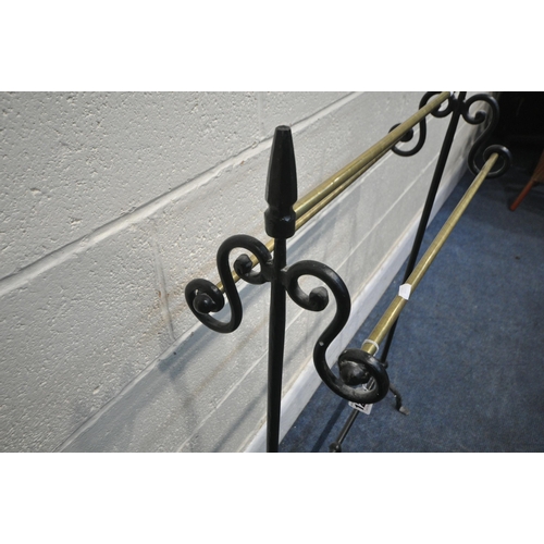 1282 - A 20TH CENTURY WROUGHT IRON AND BRASS GOTHIC TOWEL RAIL, width 63cm x depth 24cm