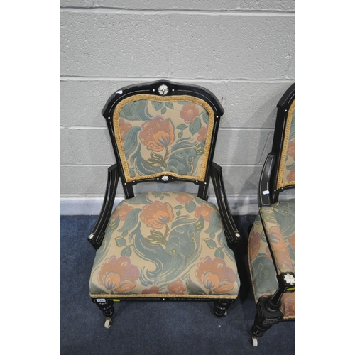 1284 - AN EARLY 20TH CENTURY EBONISED ARMCHAIR, and a matching chair (2)