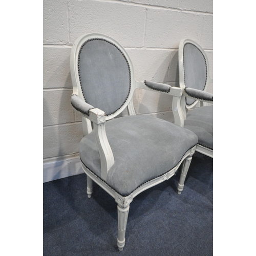 1289 - A SET OF FOUR FRENCH PAINTED ARMCHAIRS, with blue fabric (condition:-some historical cracks and repa... 