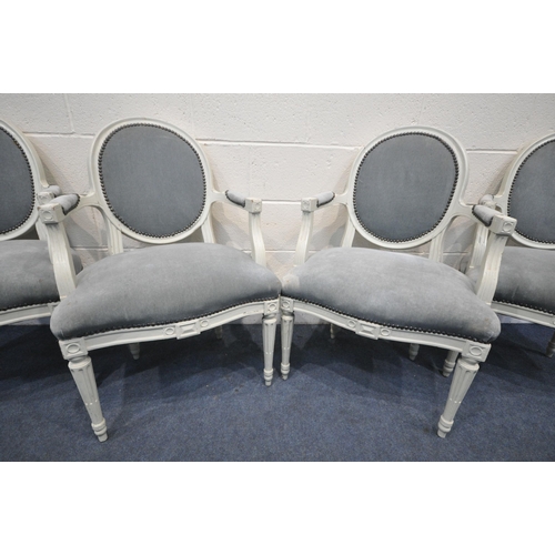 1289 - A SET OF FOUR FRENCH PAINTED ARMCHAIRS, with blue fabric (condition:-some historical cracks and repa... 