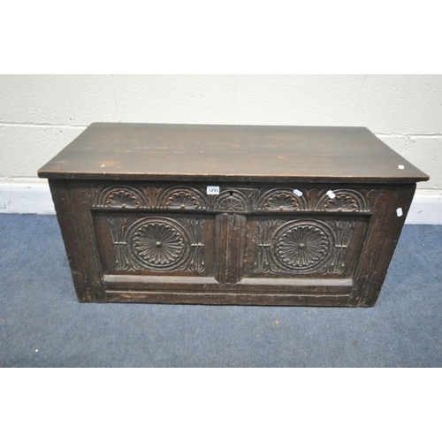 1295 - A GEORGIAN CARVED OAK PANEL COFFER, width 98cm x depth 46cm x height 43cm (condition:-feet cut down,... 