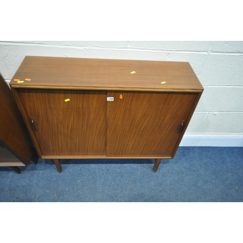 1299 - TWO SIMILAR MID-CENTURY AFROMOSIA TEAK SLIDING DOOR BOOKCASES, on tapering legs, largest width 107cm... 