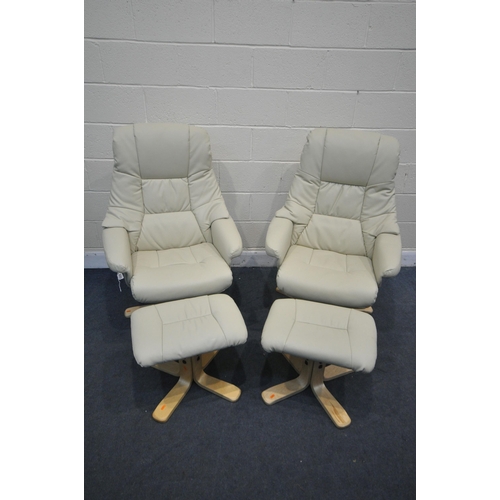 1315 - A PAIR OF CREAM LEATHER STRESSLESS STYLE SWIVEL RECLINING CHAIRS, on beech legs, and matching stools... 