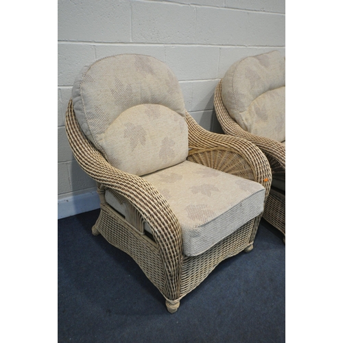 1321 - A WICKER THREE PIECE CONSERVATORY SUITE, with loose cushions, comprising a two seater settee, and ar... 