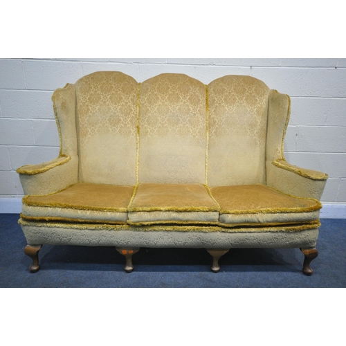 1322 - A GEORGIAN STYLE HIGH WING BACK SOFA, gold fabric, flat outswept arms, on four cabriole legs, length... 