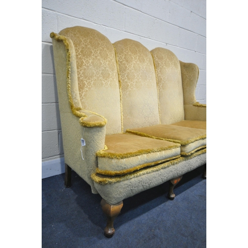 1322 - A GEORGIAN STYLE HIGH WING BACK SOFA, gold fabric, flat outswept arms, on four cabriole legs, length... 