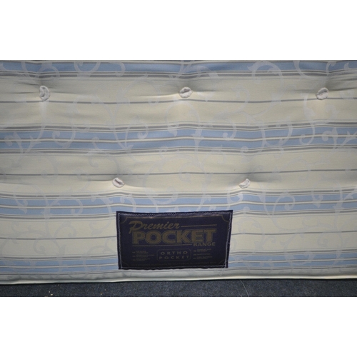 1323 - A 4FT6 STRIPPED MATTRESS