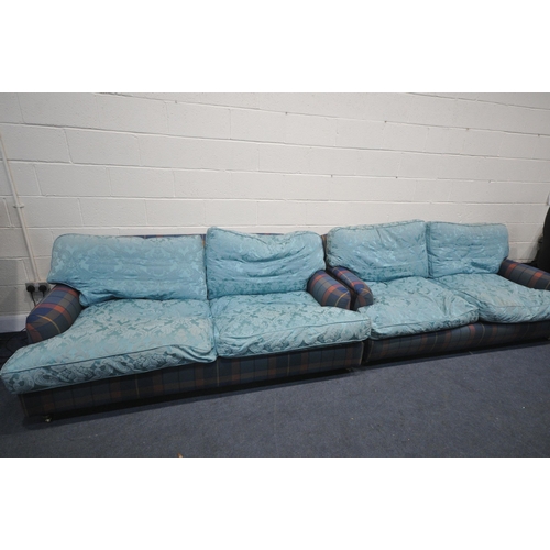 1324 - A PAIR OF HOWARD AND SONS STYLE SOFA, having tartan fabric and later blue cushions, on turned legs, ... 