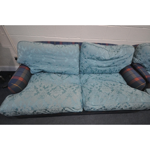 1324 - A PAIR OF HOWARD AND SONS STYLE SOFA, having tartan fabric and later blue cushions, on turned legs, ... 