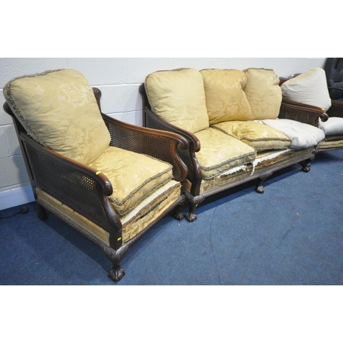 1325 - AN EARLY 20TH CENTURY MAHOGANY BERGERE FRAMED SUITE, comprising a settee, length 175cm, and a pair o... 